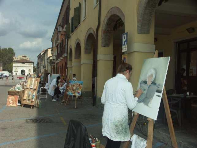 it SETTEMBRE DI ARTE MUSICA E GIOCHI AL PORTELLO Edizione 2013 Fin dal mattino, lungo i portici di via del Portello, alcuni pittori dell associazione Momart hanno