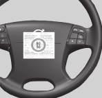 Staccare l'etichetta della velocità max consentita (collocata su un lato del compressore) e applicarla sul volante.