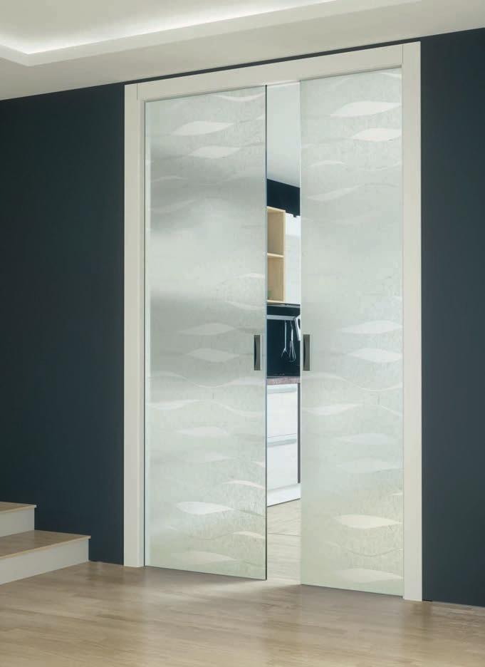 Sliding door inside wall Easy in two section, white lacquered wooden jamb.