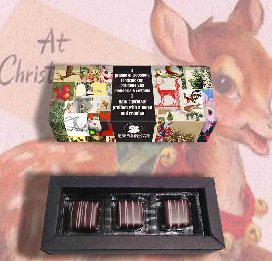 Le praline sono disponibili anche in una confezione da 3 e sfuse in cartoni da 1,5 kg. A jewel box contains nine pralines of dark chocolate with hazelnuts and almonds.