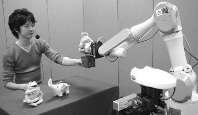 Robots that Learn to Converse: