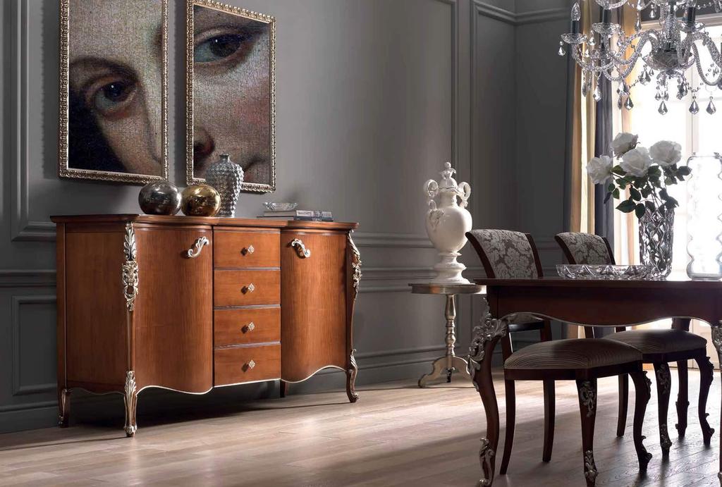 9 Una credenza dalle forme morbide e sinuose, che ricordano la sensualità femminile, suggerisce con il calore del legno una sensazione di benessere e di armonia.