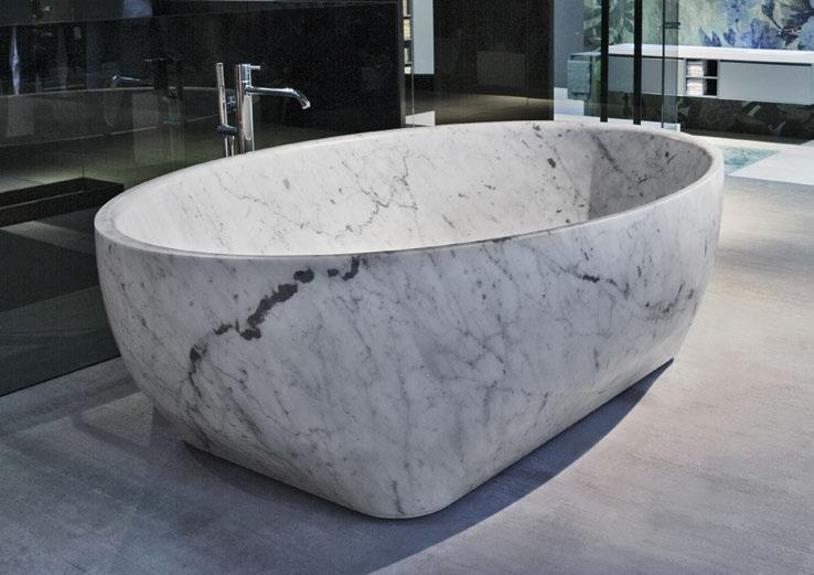 L 130 55 Oval stone bathtub complete with drain and pressure plug. P.S.