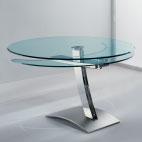 Extension dining table with base painted metal. Tempered glass top 12 mm thick.