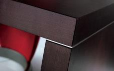 Desk with extensible top in cherrywood or wenge. Fix wooden side black matt lacquered. Glass side 19 mm thick.