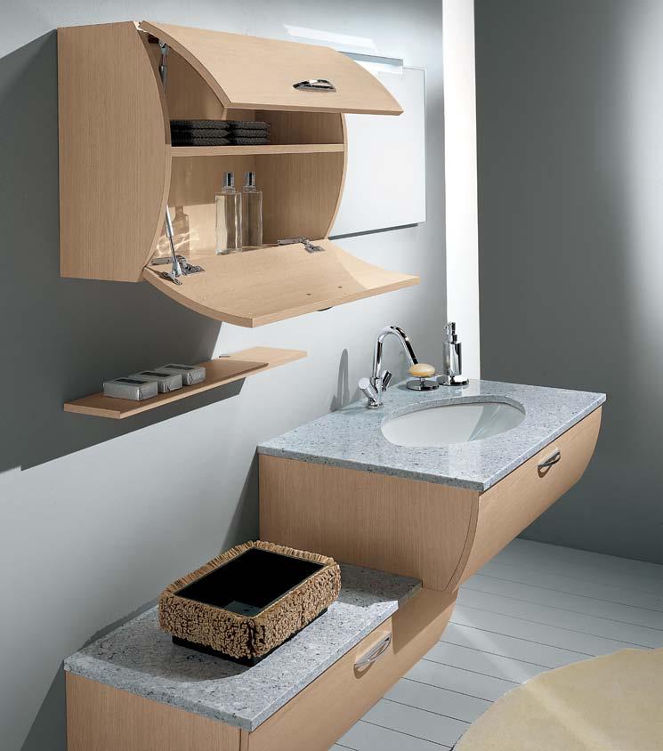 GIOVANE E PROPOSITIVO Una soluzione compositiva a volumi sfalsati e una leggerezza, per una stanza da bagno giovane e