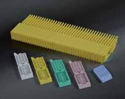 STACKABLE EMBEDDING CASSETTES Histological embedding cassettes in acetal resin, stackable in rows of 40 pieces. Easy to be inserted on the automatic printer loader. Dim. 40 x 28 x 6 mm.