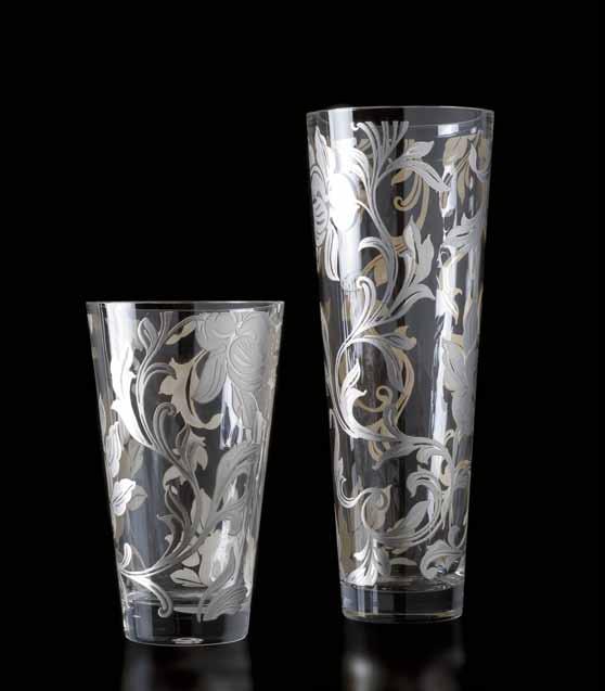 Conic vases made of double thickness mouth blown transparent glass.