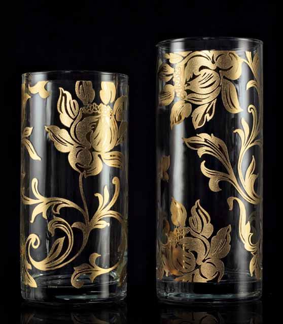 Doppia cottura a 530. Cylindrical vases made of transparent glass.