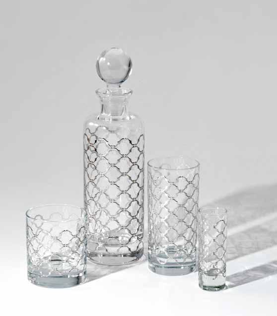 Whisky and Liqueur bottle made of double thickness mouth blown glass; stopper made of mouth blown transparent glass. Whisky, tumbler and liqueur glasses made of transparent glass.