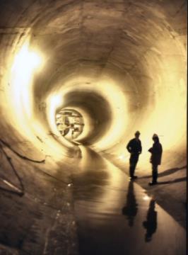 and provide an outlet for floodwaters to reduce street and basement sewage backup flooding. Phase I: four distinct tunnel systems: Mainstream, Des Plaines, Calumet, and Upper Des Plaines.