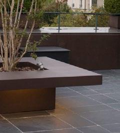 Table designed to house trees, realized in bronzed or RAL 7034 AISI 304 stainless steel, particularly suitable for use in terrace and gardens.