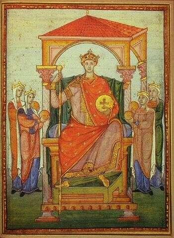 L'imperatore è ritratto seduto in trono e regge le insegne del potere sia temporale sia spirituale.