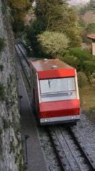 Reach Città Alta and San Vigilio Hill with the traditional cable car systems.