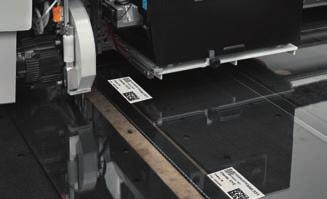 Stampante digitale (600 dpi) per l applicazione automatica di etichette, installata su carrello