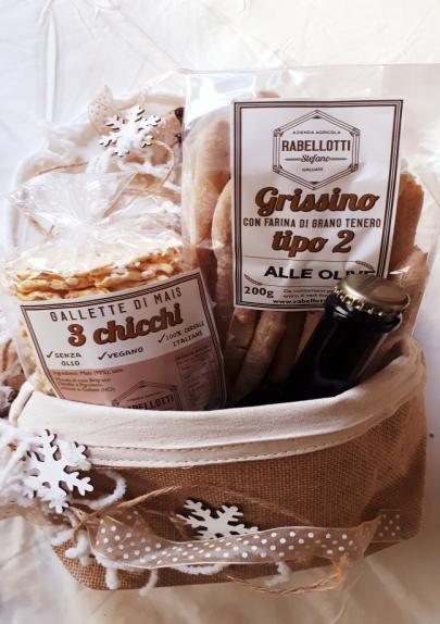 IDEE REGALO EURO 15,00 APERITIVO Confezione composta da 1 cestino di juta per il pane, 1 confezione di Grissini ( a