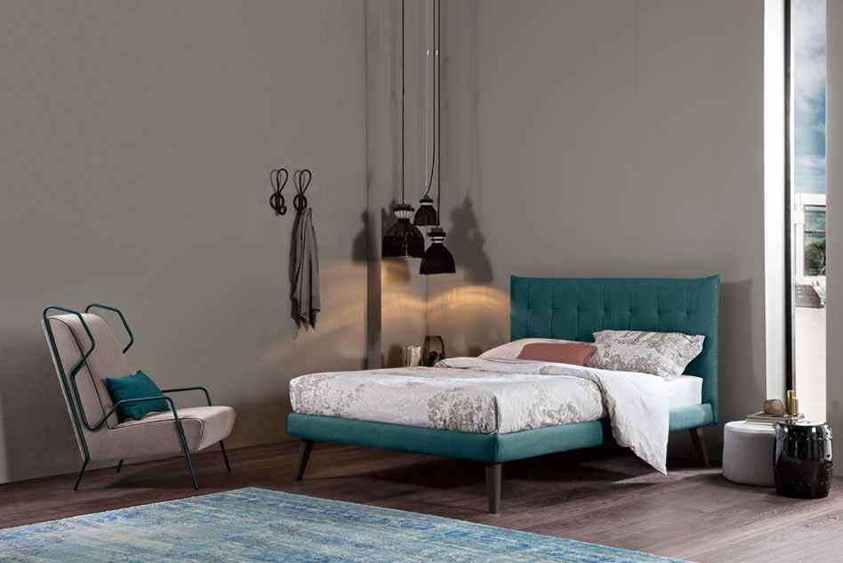 The slats in the shoulder area are contoured in order to ensure greater elasticity when sleeping on one's side. PANF H.12 Letto tessile con rete portante legno.