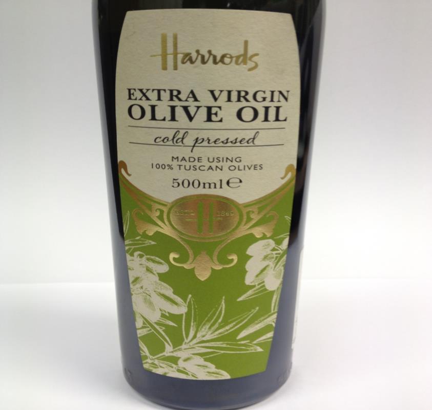 Esempi di alcuni. casi ex Officio Tuscan Olio extra vergine d oliva con il marchio Harrods bottled in the UK.