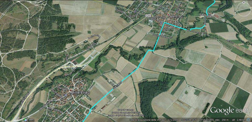 350m e giriamo a sinistra sulla Stiegel che ci riporta in aperta campagna; attraversiamo ancora il fiume Streu,