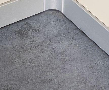 ILLUMINAZIONE Multiforo a riquadri PAVIMENTO In linoleum grigio Si