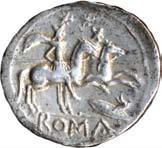R/ Dioscuri a destra; sotto le zampe anteriori dei cavalli, scudo e carnyx; in esergo, ROMA;