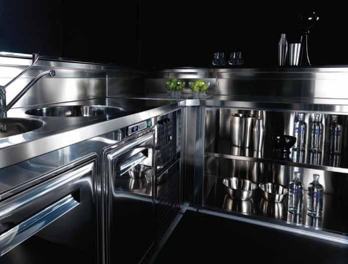 Detail of the open-fronted cupboard with stainless steel shelf.