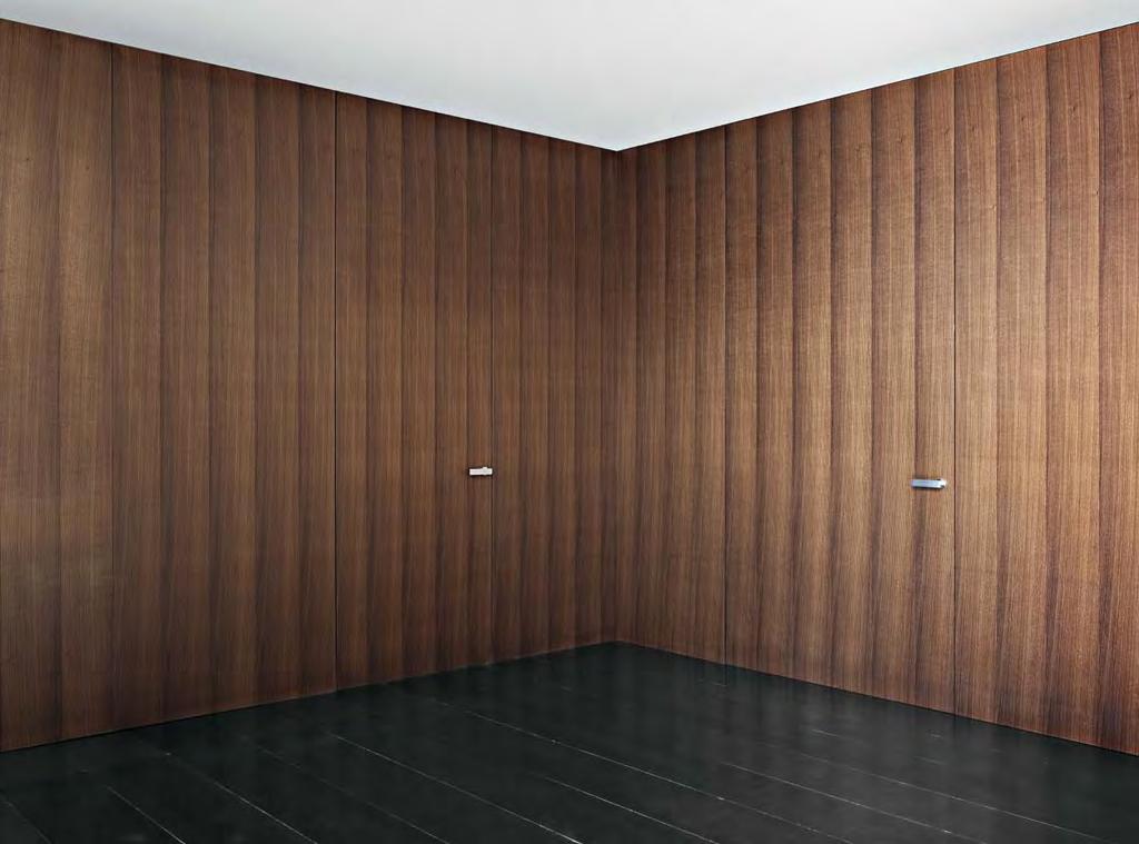 Wall & Door in vertical oak termowood: all the elegance of warm and material