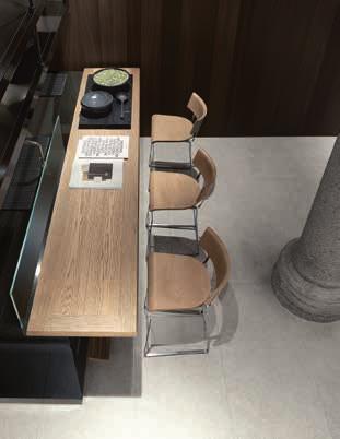 Era snack bar in NTF fossil oak slats. Olimpia stools structure in steel, back and seat in NTF fossil oak.