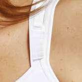 cuciture Il tessuto della coppa, elastico in 4 direzioni, si adatta perfettamente al seno espandendosi o contraendosi per un maggiore comfort Le diverse zone di compressione favoriscono il processo