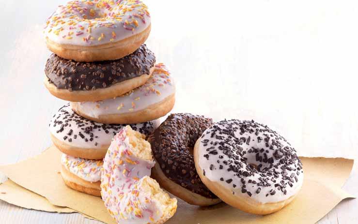 Donut with milk chocolate. portions portions Donut with sugar decoration.