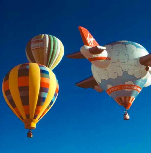 These hot-air balloons float because they are filled with air at high temperature and are surrounded by