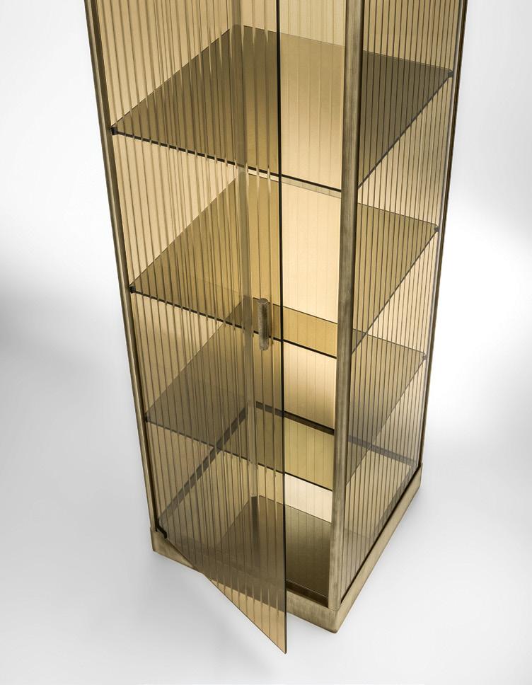 Showcase made of 6 mm bronze glass structure and door, engraved and tempered. Shelves in 6 mm bronze tempered glass. Base and top in lacquered wood, burnished brass finish.