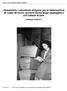 Alessandria. Laboratorio artigiano per la fabbricazione di casse da morto, giovane donna legge appoggiata a una catasta di bare.