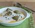 Polenta arrostita su fonduta di Parmigiano Reggiano 24 mesi, lamelle di tartufo nero e burro alle nocciole