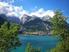 Molveno. LAGO DI MOLVENO, DOLOMITI DI BRENTA Come un grande villaggio turistico, nel cuore delle Dolomiti, tra lago e montagna.