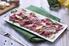 Carne salada cruda fatta in casa e insalatina di rucola con carpaccio di grana. Carpaccio di manzo al profumo di tartufo, rucola e scaglie di grana